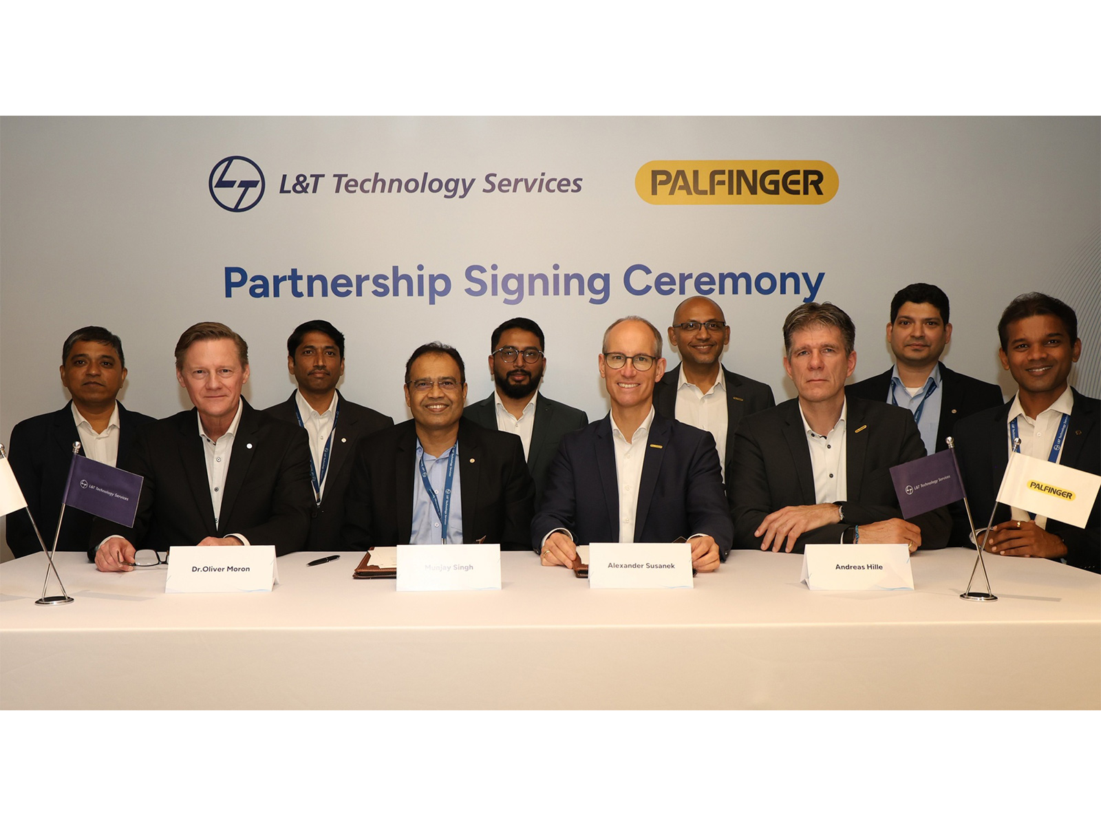 Alexander Susanek (COO) & Andreas Hille (SVP, Product Line Management & Engineering) from PALFINGER with Mritunjay Singh (COO) & Dr. Oliver Moron (VP, EU-DACH) from LTTS along with other dignitaries