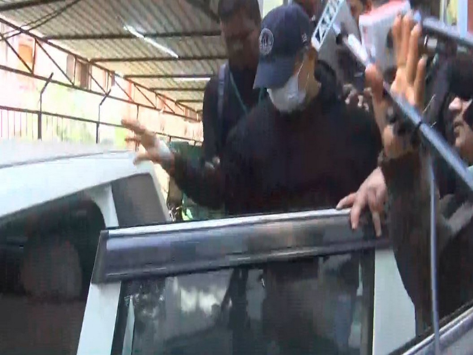 Ajay Gupta being taken to Saket district court (Photo/ANI)