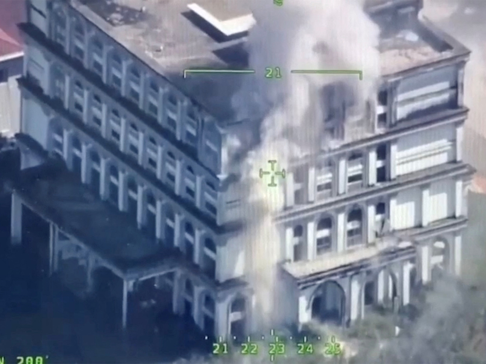 A drone view shows smoke rising from a building following an explosion, near the Trat and Thmar Dar border between Thailand and Cambodia (Photo/Reuters)