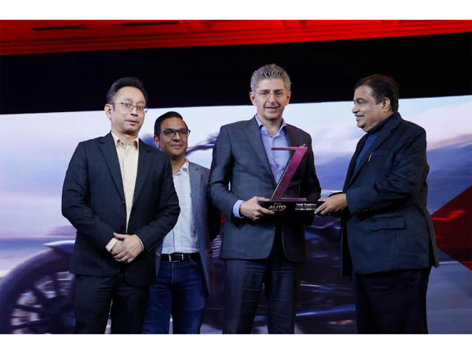 Boman Irani receives the Best 350cc Motorcycle Award for the YEZDI Roadster from Union Minister Nitin Gadkari at the Zee Media Auto Awards 2025