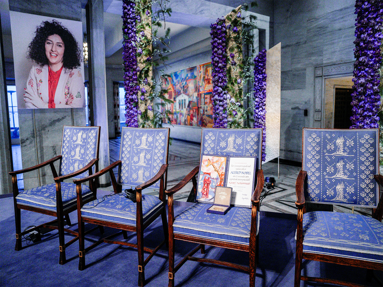 An empty space showing that Nobel Peace Prize winner Narges Mohammadi was not present during the award ceremony at Oslo City Hall (Photo/Reuters)