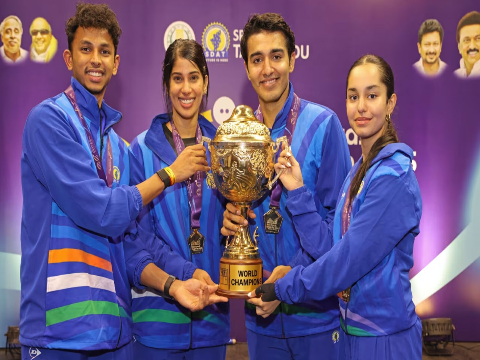 Indian squash team with the World Cup trophy. (Photo: Olympics.com)