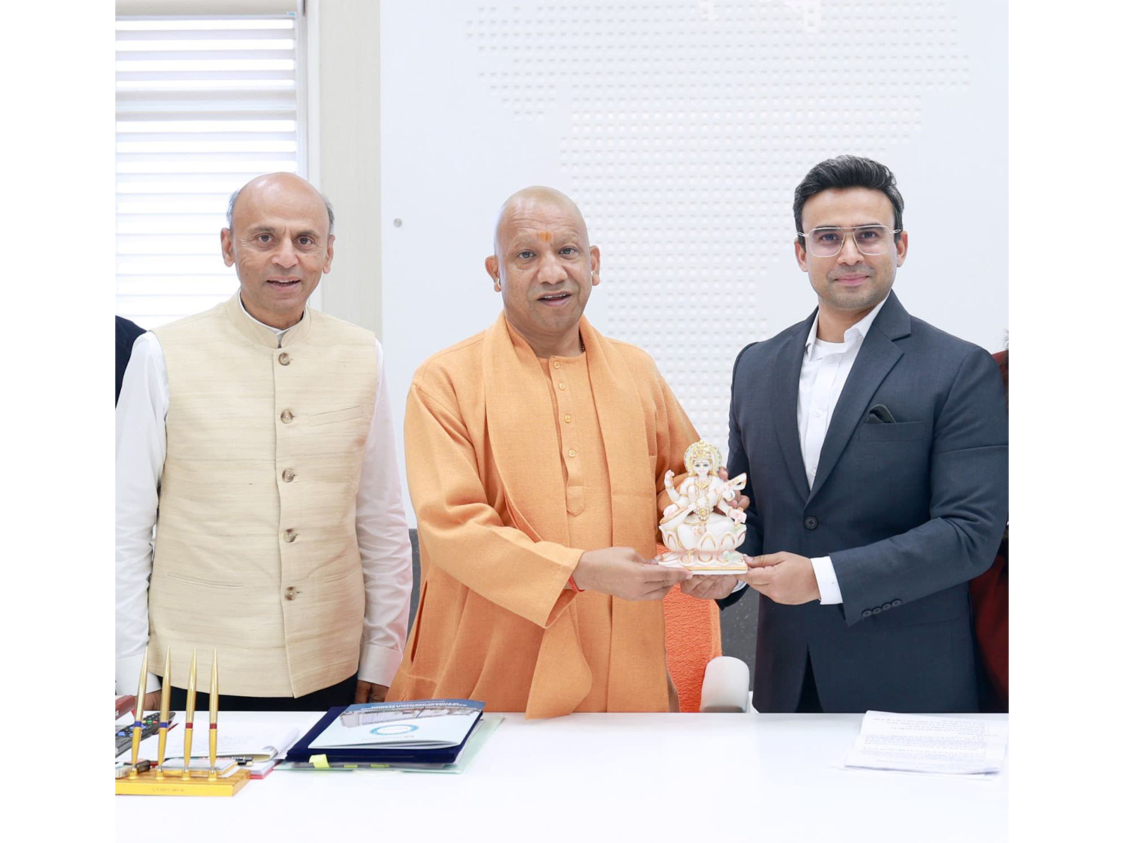 Hon'ble CM Shri Yogi Adityanath ji with Dr. Dhruv Galgotia, CEO, Galgotias University, appreciating the University's global academic progress
