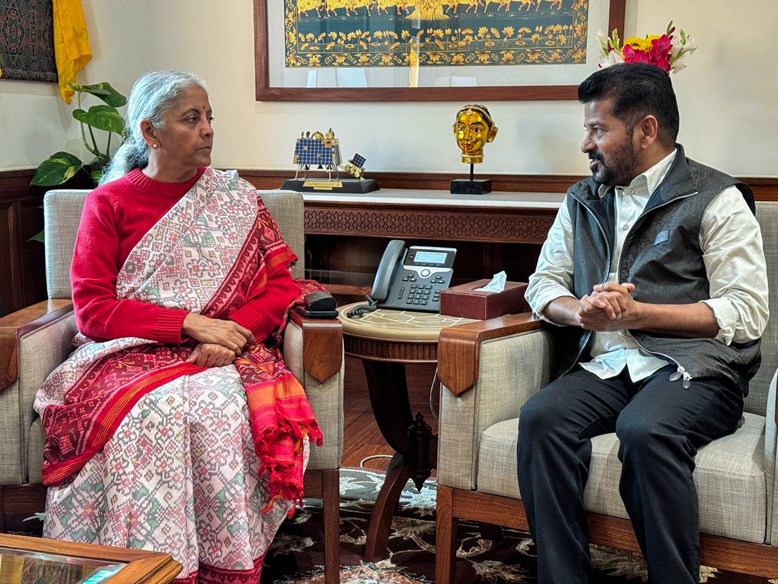 Telangana Chief Minister Revanth Reddy calls on Union Minister Nirmala Sitharaman at Parliament House, in New Delhi on Tuesday. (@nsitharamanoffc X/ANI Photo)
