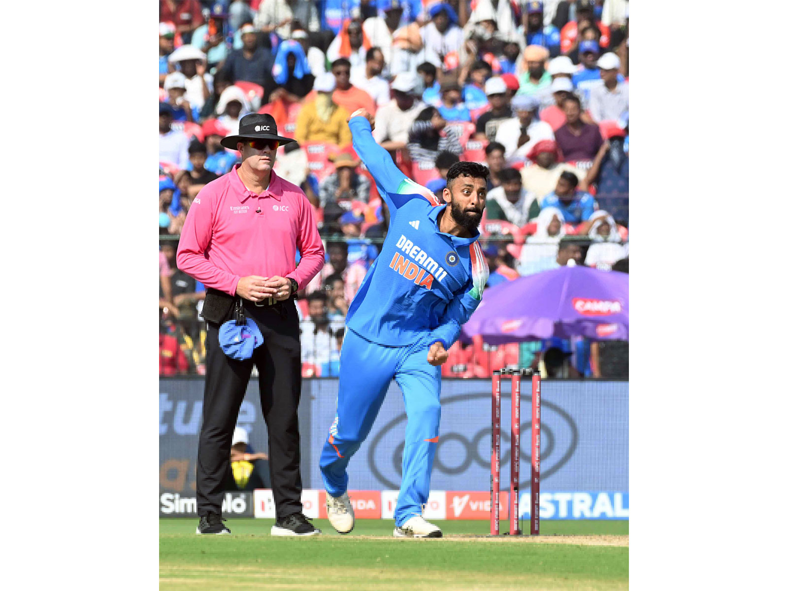 Varun Chakravarthy bowling (Photo: ANI)