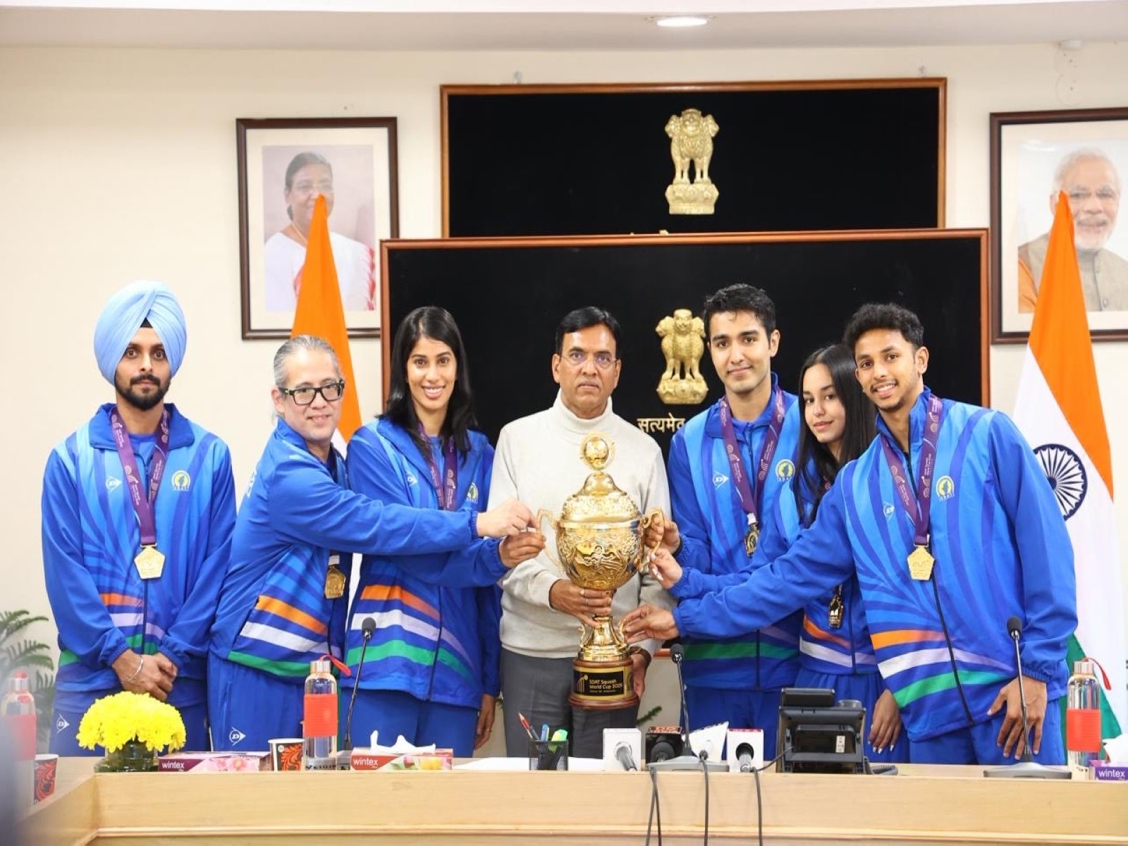 Mansukh Mandaviya with the Indian Squash Team (Photo/PIB)