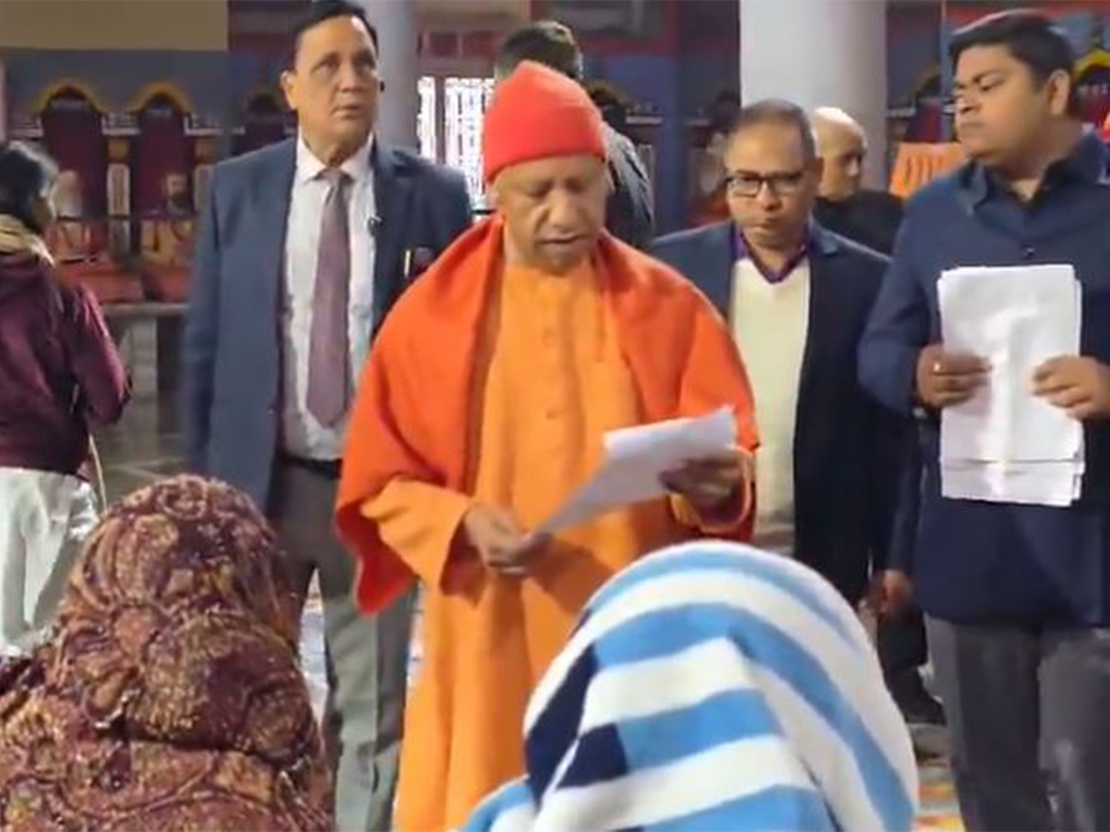 Yogi Adityanath interacting with citizens during 'Janata Darshan' at Gorakhnath Temple. (Photo/ @myogioffice)
