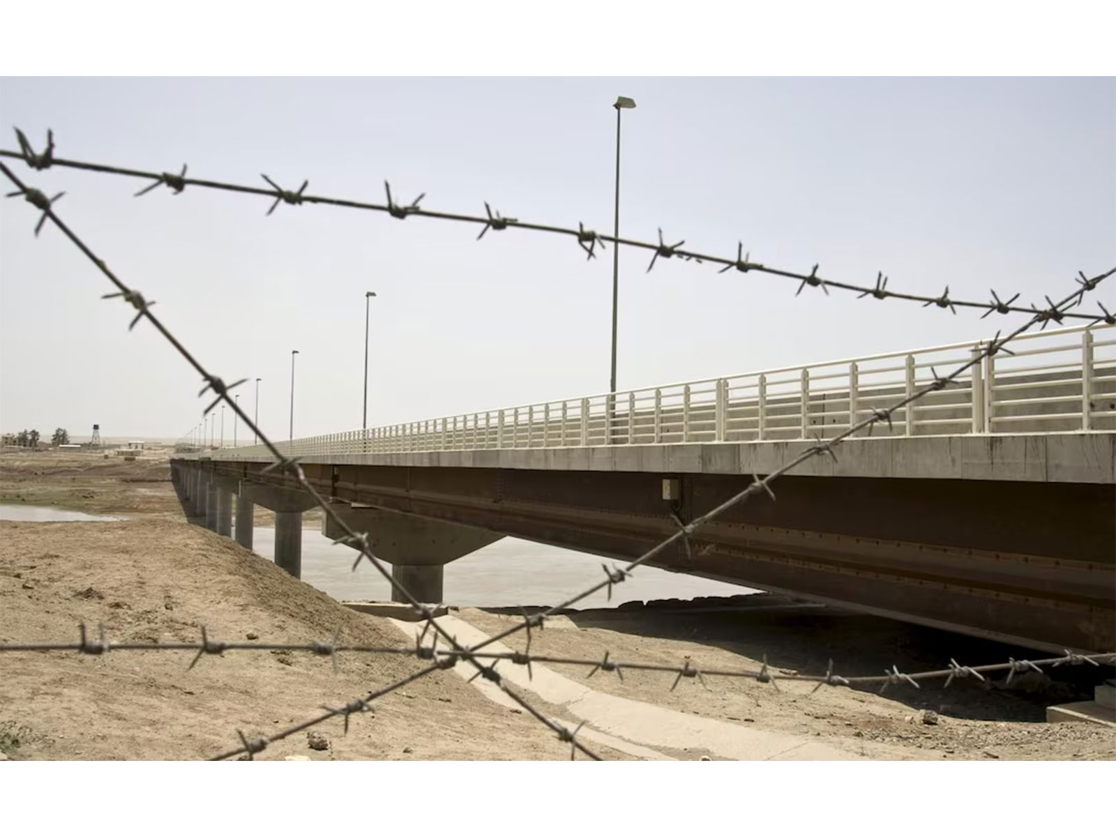 A view of a bridge leading to Afghanistan across the Panj River at the Panji Poyon border outpost, south of Dushanbe, Tajikistan. (Photo/Reuters)
