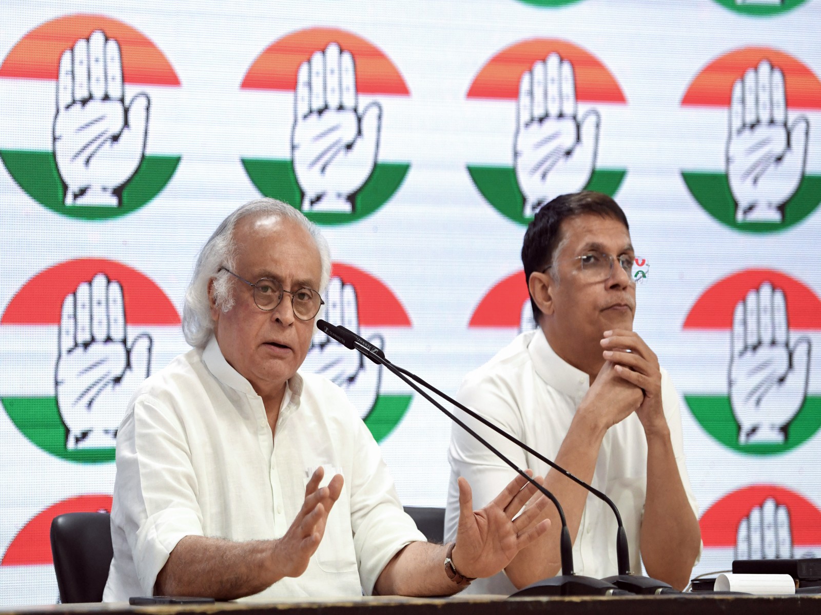 Congress MP Jairam Ramesh and leader Pawan Khera (Photo/ANI)