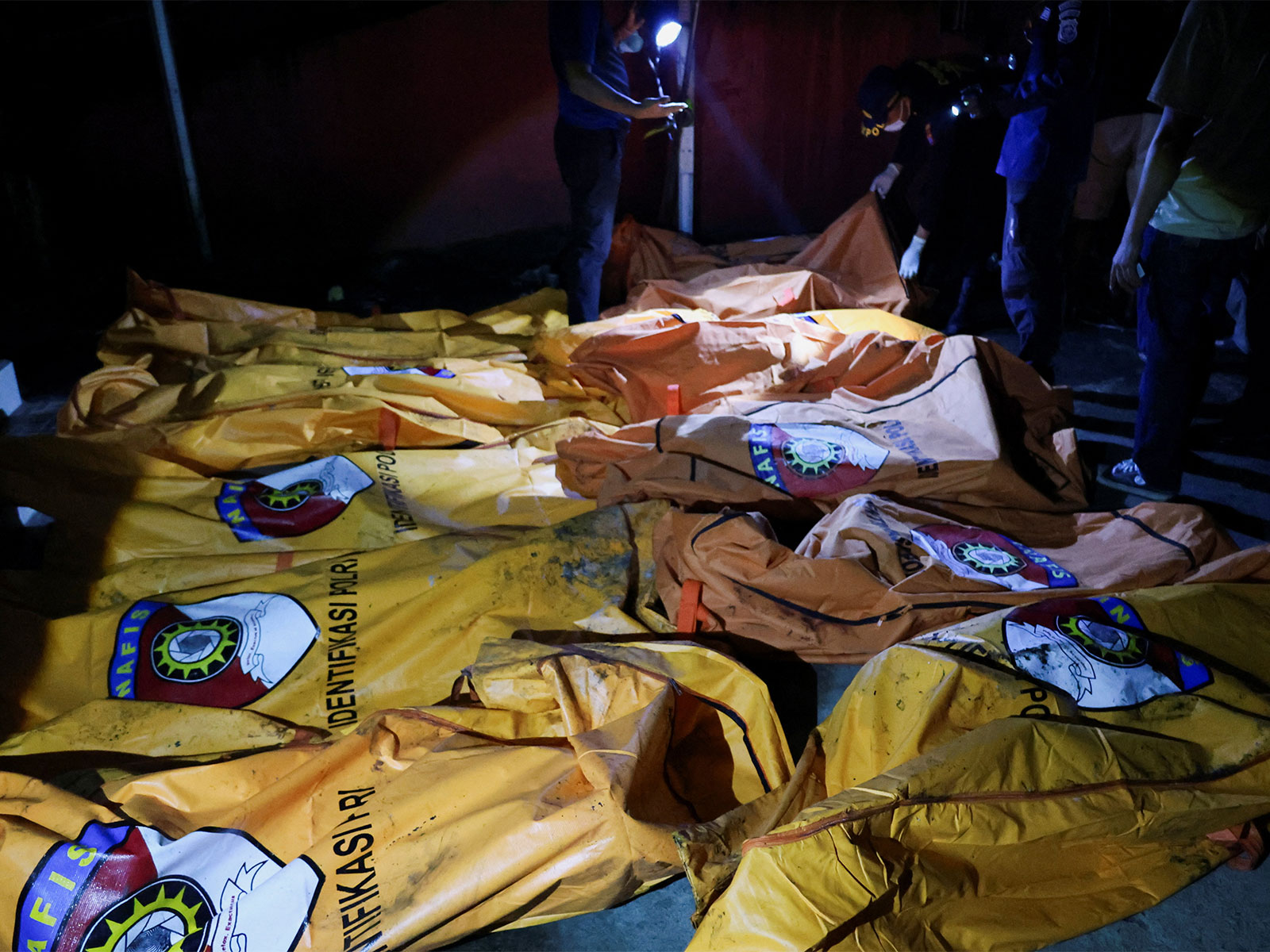 Body bags containing the victims from the fire in Manado, Indonesia (Photo/Reuters)