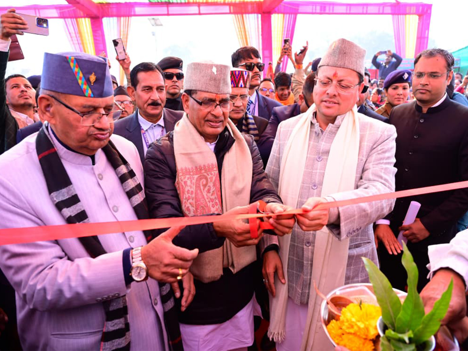 Uttarakhand CM Pushkar Singh Dhami and Union Agriculture Minister Shivraj Singh Chouhan at the state-level Farmers' Day event in Gauchar (Photo/Uttarakhand CMO)