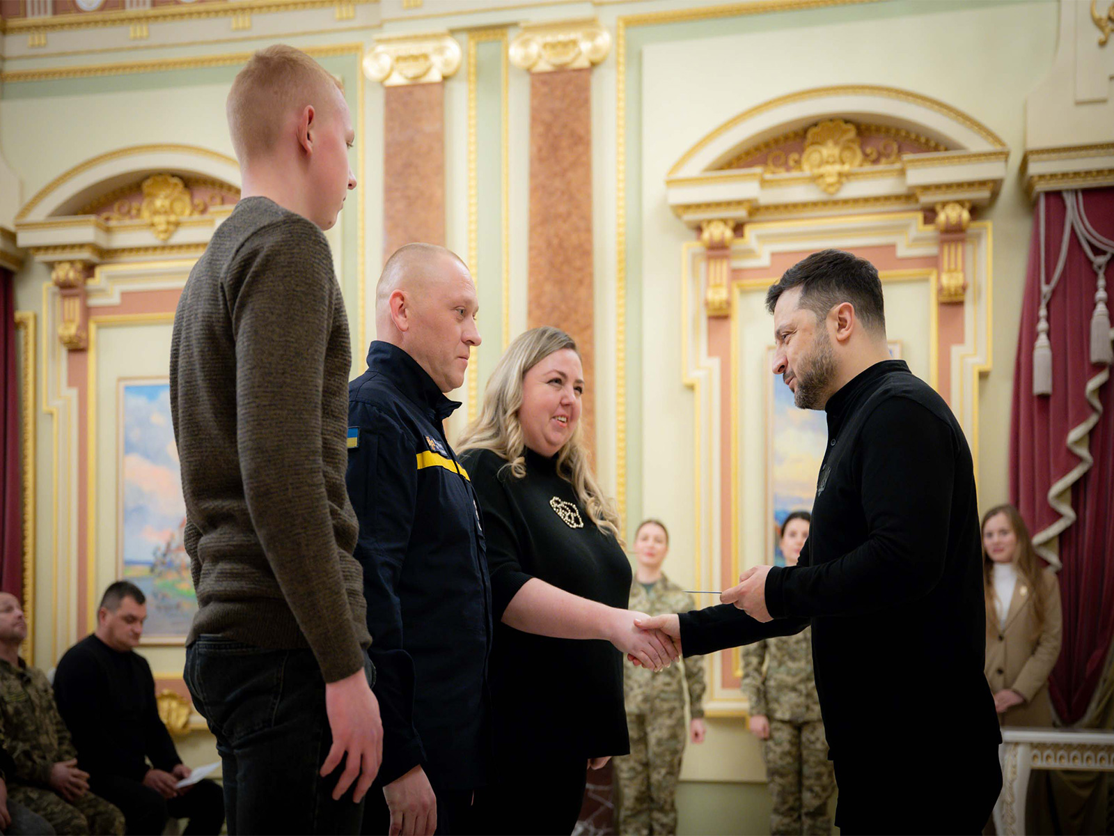 Ukrainian President Volodymyr Zelenskyy housing certificates to members of Ukraine's security and defence forces (Photo/ X@ZelenskyyUa)