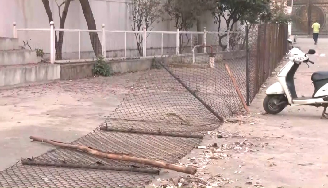 Torn banner  outside the MLA G Janardhana Reddy's house (Photo/ANI)