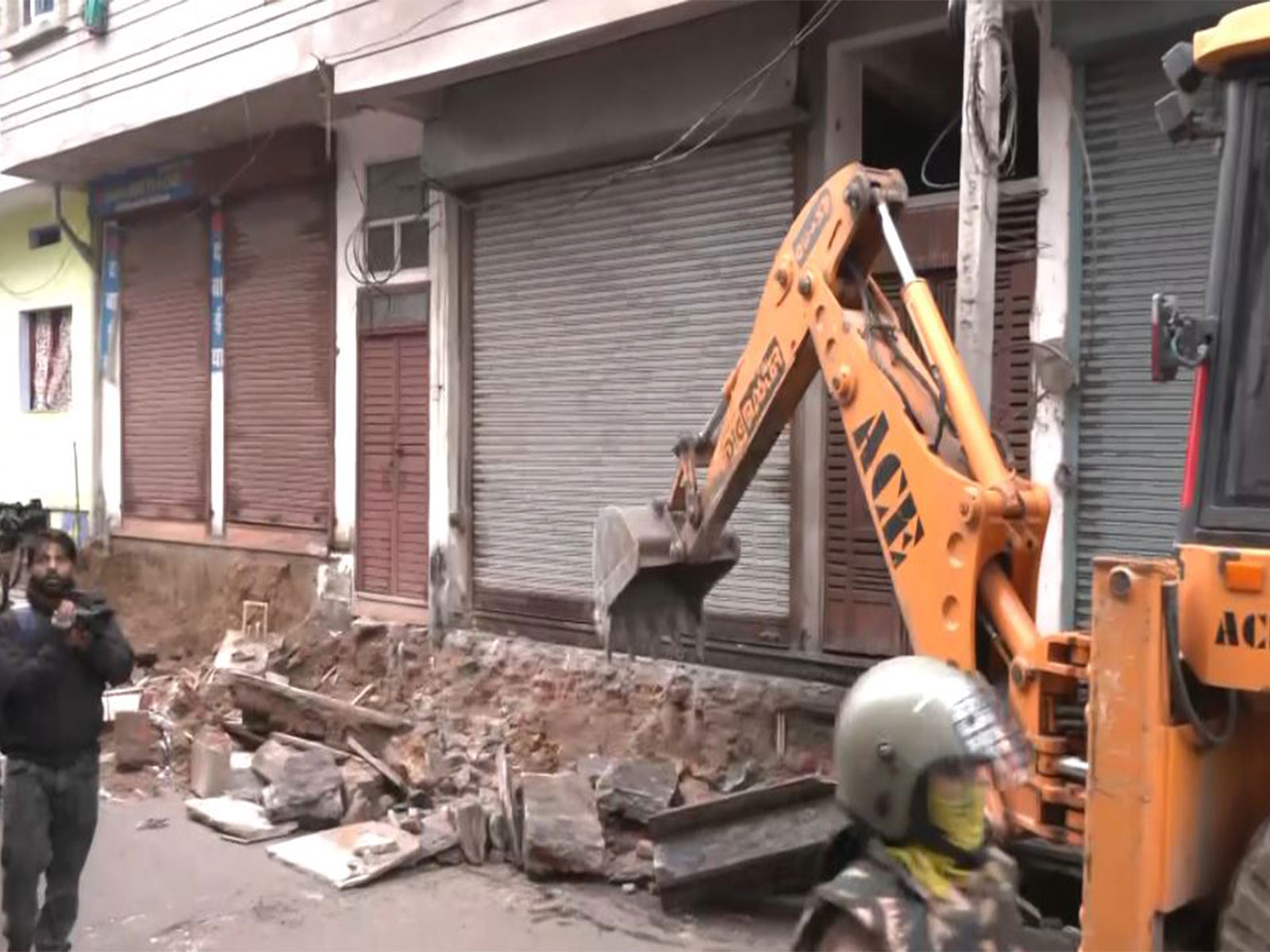 Bulldozing process in the Jaipur's Chomu town underway  (Photo/ANI)
