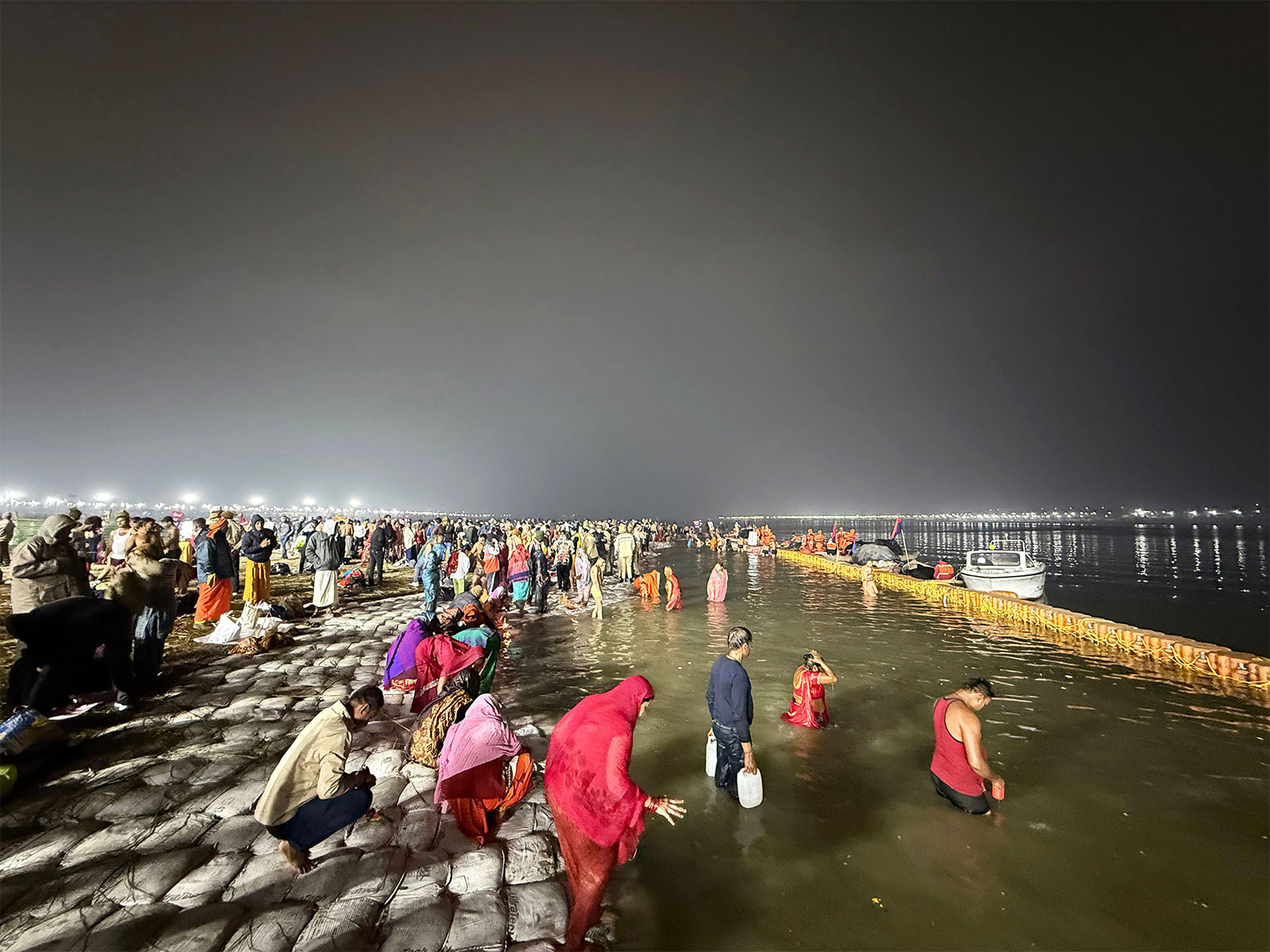 Devotees take dip at the Triveni Sangam in Prayagraj (Photo: @myogiadityanath/X)