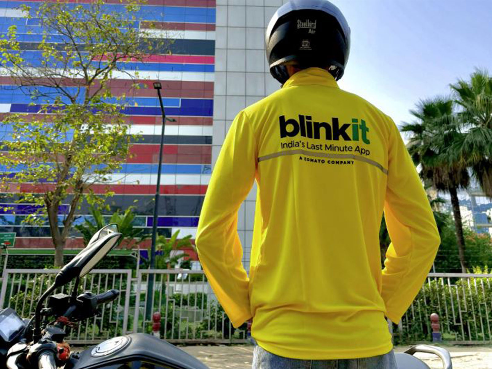 A Blinkit delivery partner (Photo/@letsblinkit)