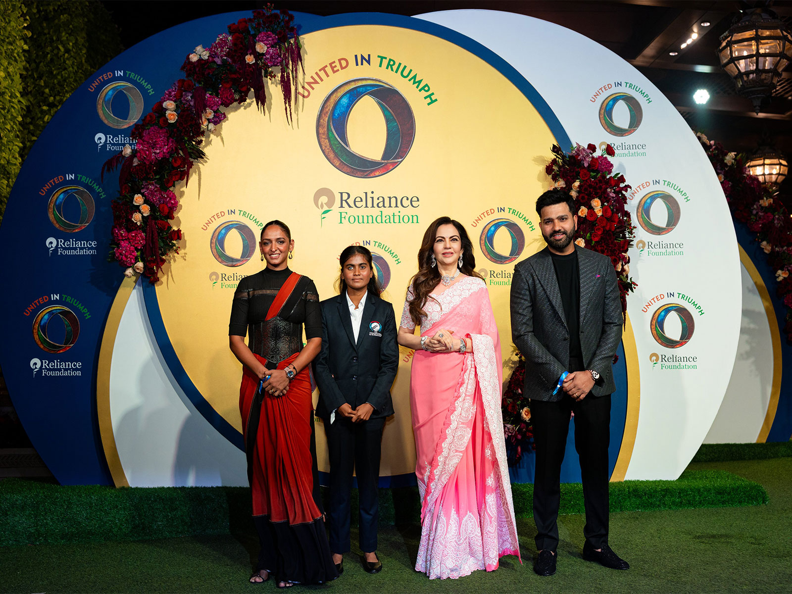 Indian skippers Harmanpreet Kaur, Deepika TC and Rohit Sharma with Nita Ambani. (Photo: Reliance Foundation)