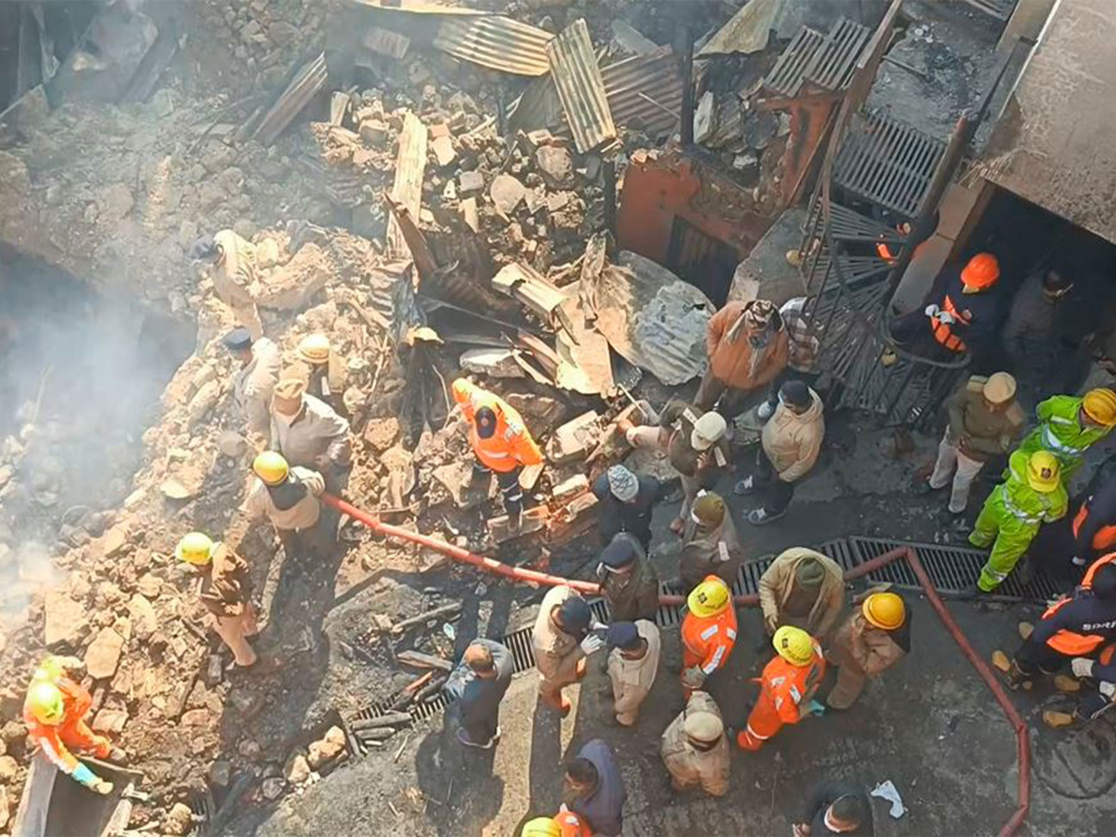 Fire tenders clearing debris after a fire incident at Himachal Pradesh's Solan (Photo/ANI)