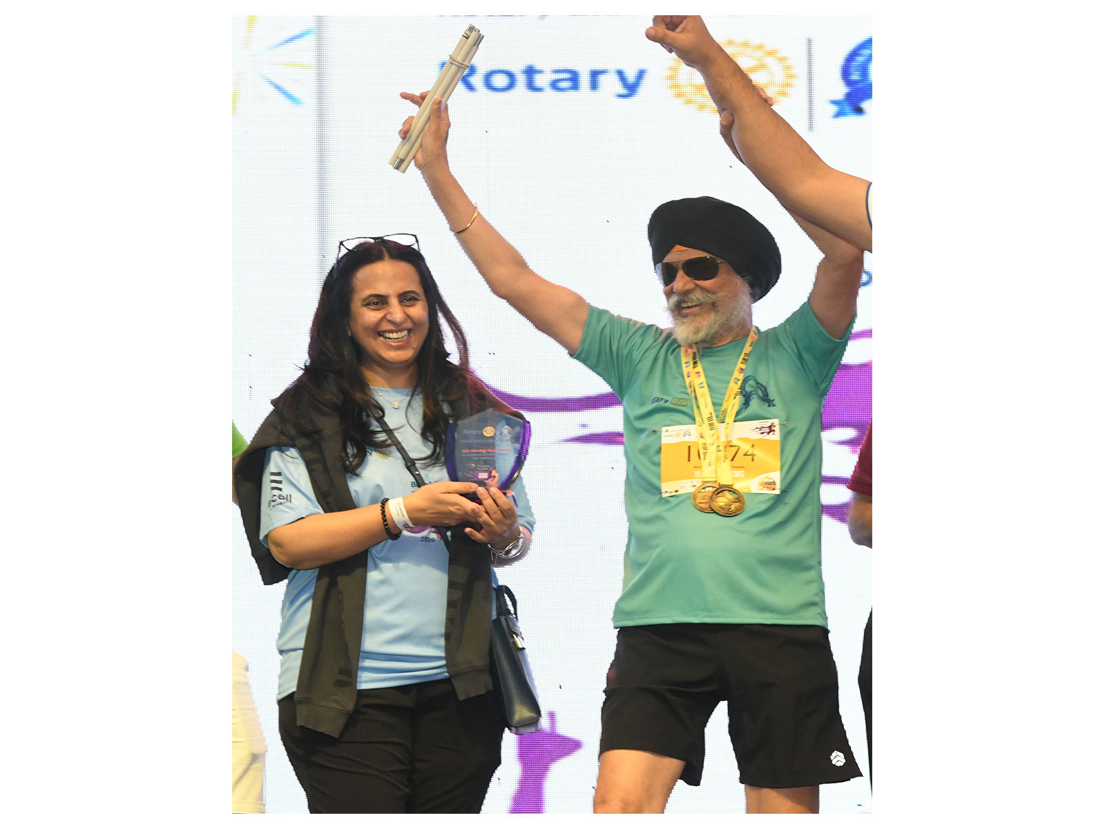 Amarjeet Singh Chawla, aka 'SportySikh,' celebrates his 100th 10-km run at the 14th edition of Brookfield Properties Powai Run, alongside Charu Thapar, EVP & Head of Operations & CRM, Brookfield Properties