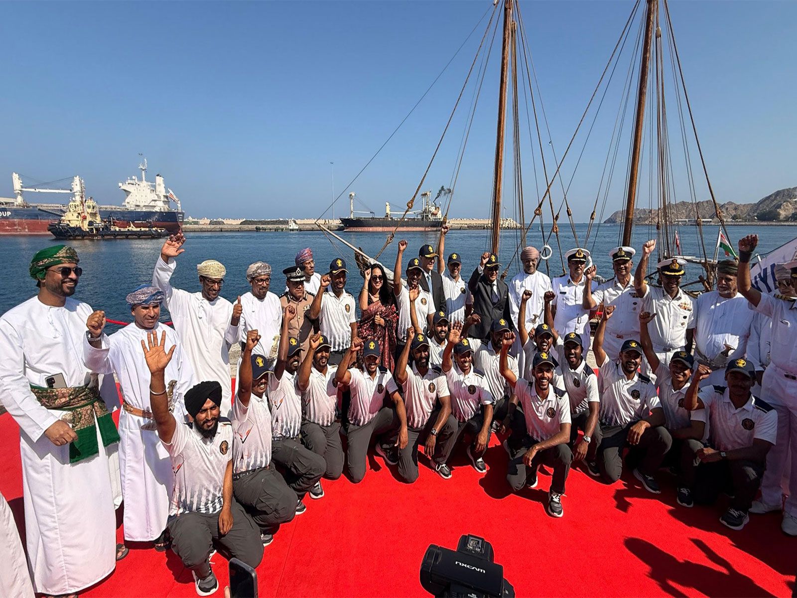 Crew members of Indian Naval Sailing Vessel (INSV) Kaundinya pose for a group photograph after the vessel's maiden voyage from Porbandar to Muscat. (Photo: X/@MEAIndia)