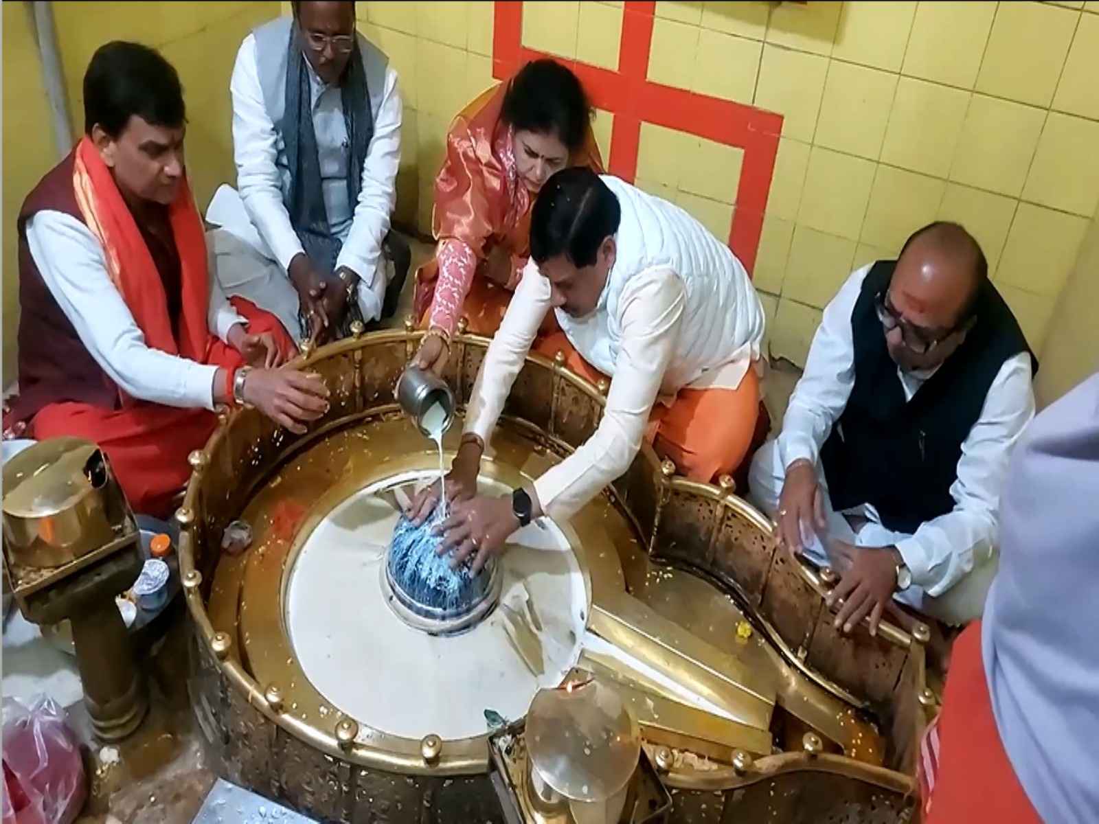 MP CM Mohan Yadav along with his wife performing the worship rituals (Photo/ANI)