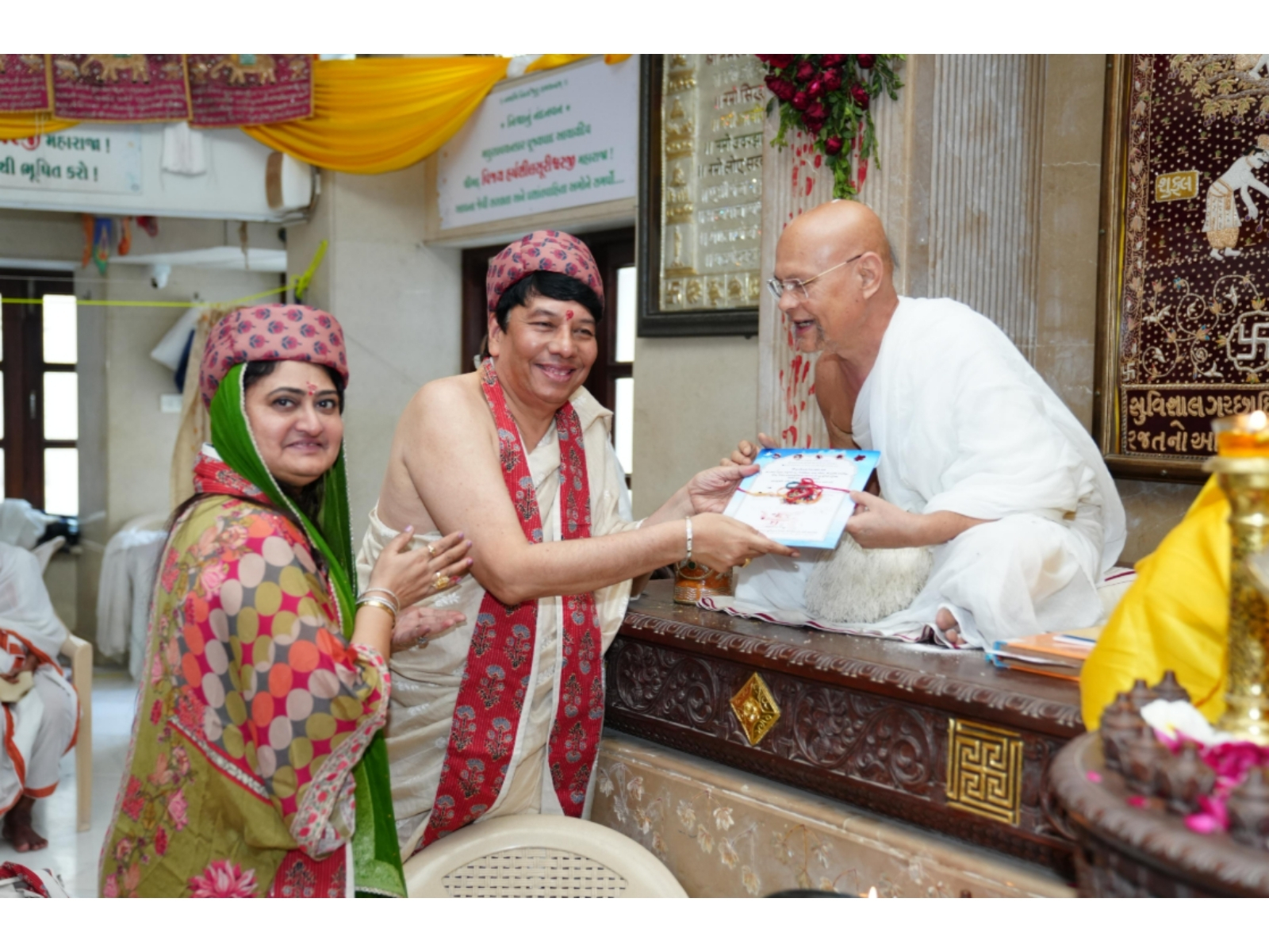 Shri Sanjay Jivanlal Shah, Vice-President of Shri Jain Religious Education Sangh, and his wife Alpaben invite Gurumaharaj Shri Vijaypradeepchandra Surishwarji Maharaj.