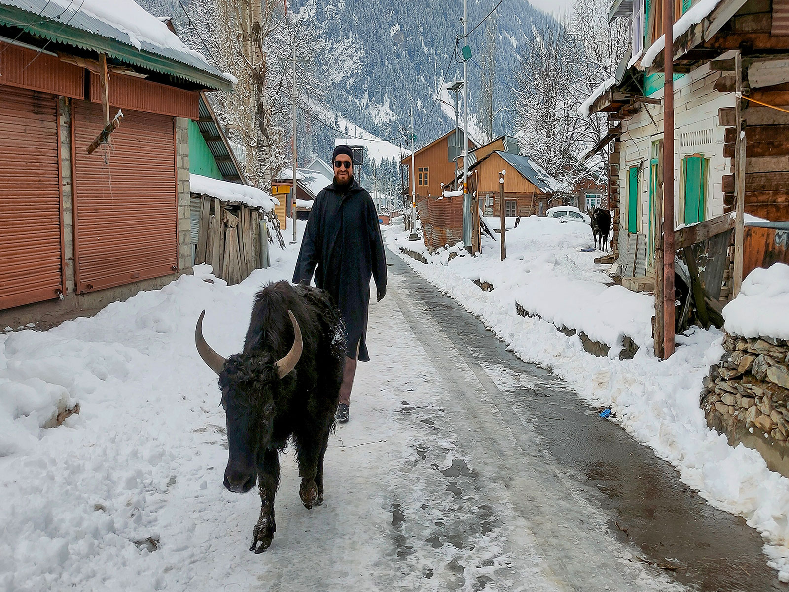 A view of the snow-covered Achoora village area of Gurez valley of J&K. (Photo/ANI)