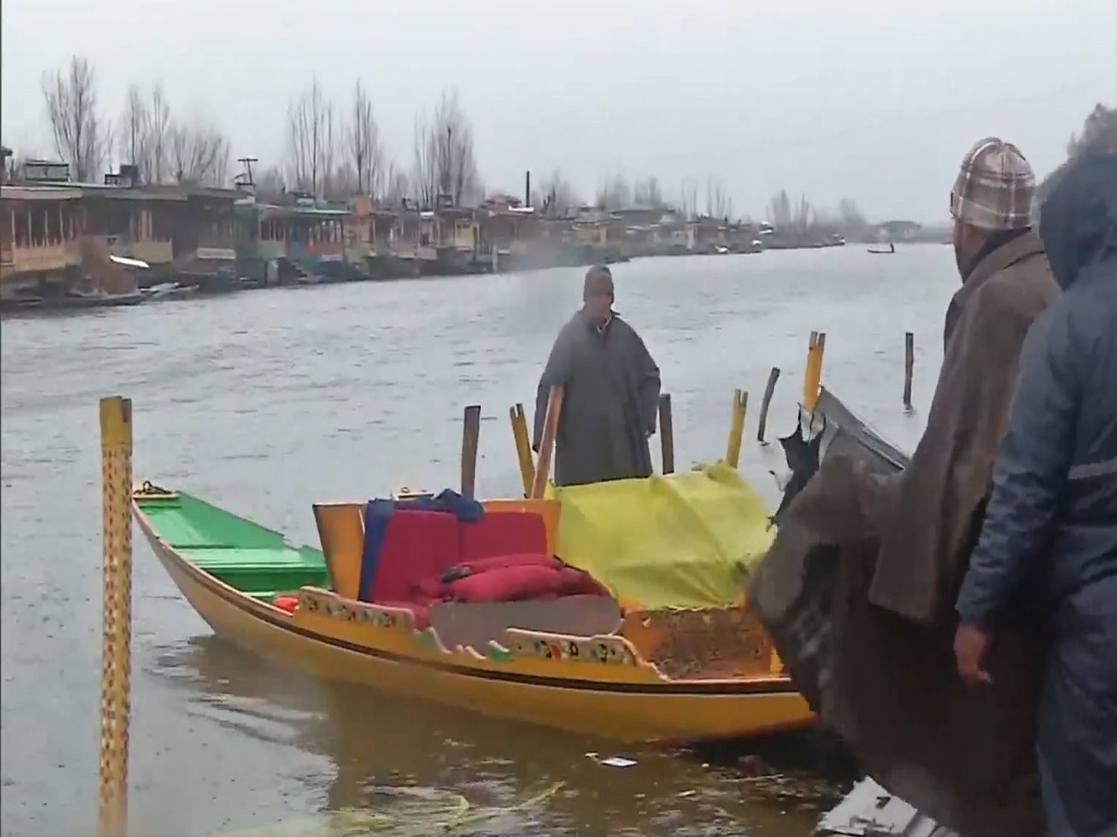 Shikaras damaged as gusty winds hit Srinagar's Dal Lake (Photo/ANI)
