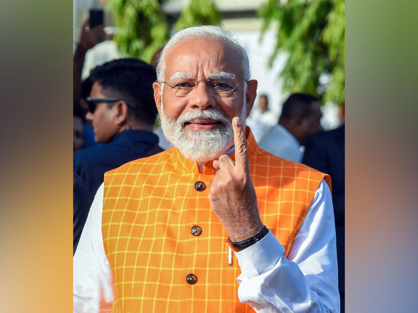 Prime Minister Narendra Modi shows his ink-marked finger after casting vote (File Photo/ANI)
