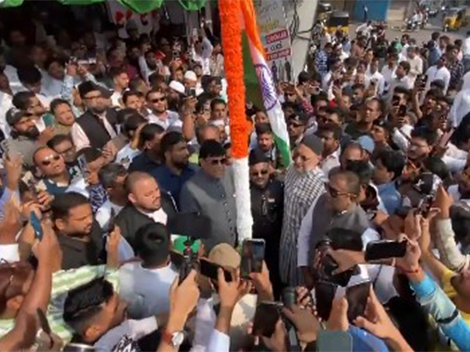 AIMIM chief Asaduddin Owaisi unfurls National Flag on 77th R-Day  celebrations (Photo/ANI)