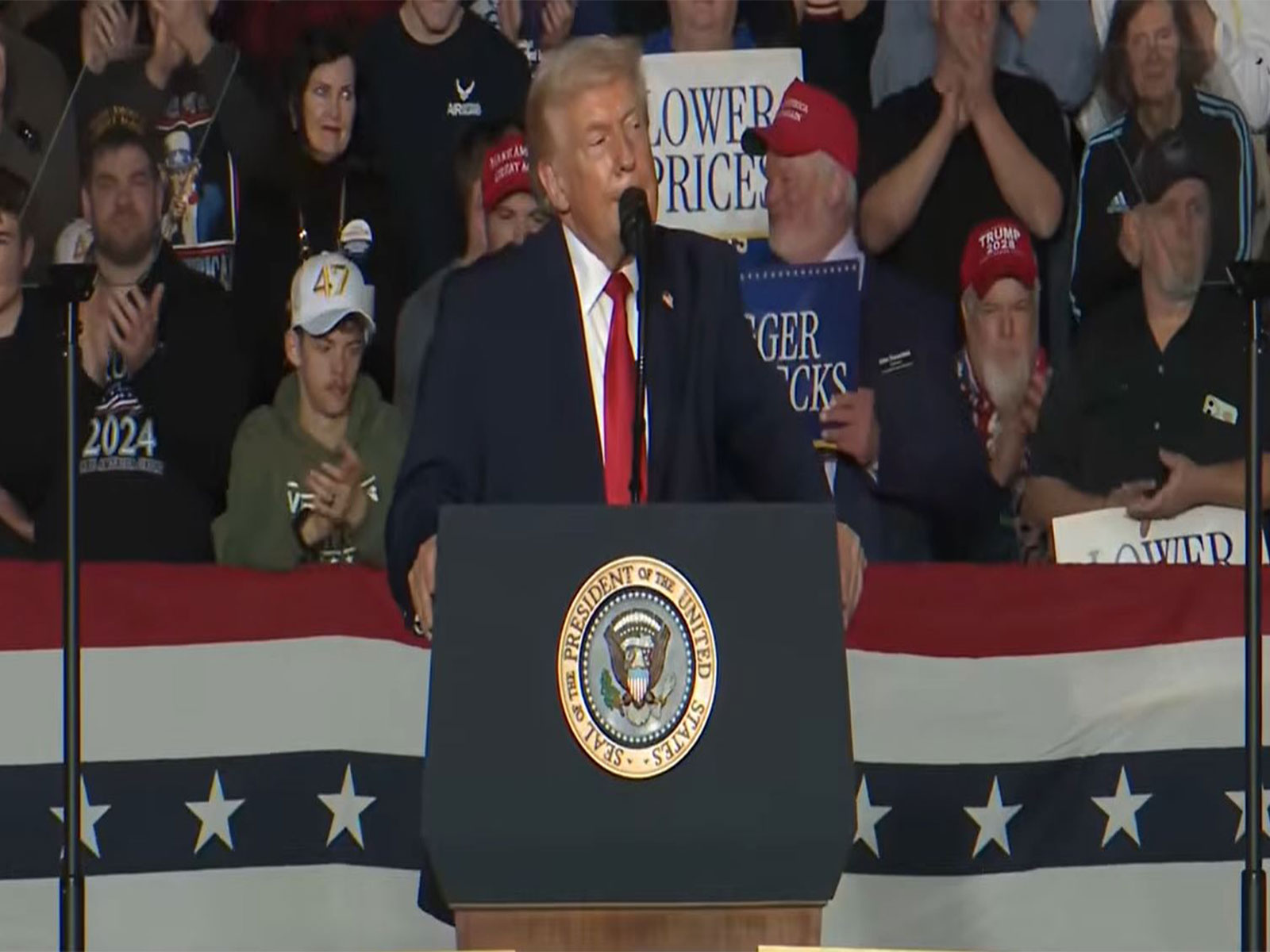 US President Donald Trump speaks during a campaign-style event in Clive, Iowa, amid ongoing legal uncertainty over his administration's global tariff policy. (Image Source: The White House/YouTube)