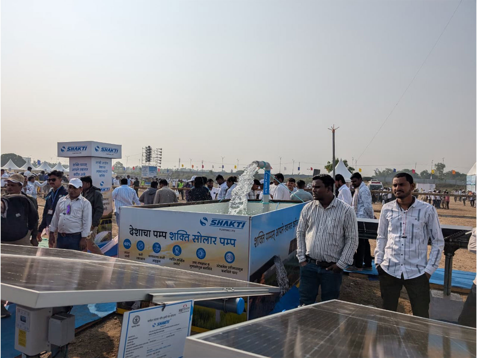 Farmers at exhibition are checking out Shakti Solar Pumps