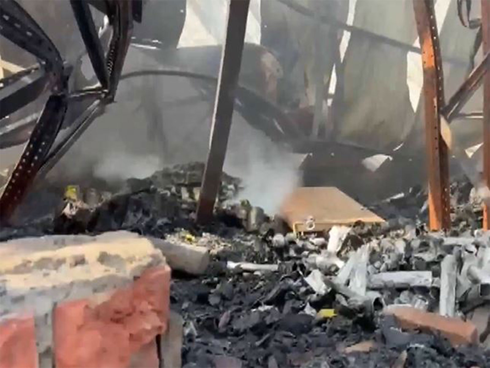 Visuals from the spot where a fire broke out in a manufacturing unit in Anandapur (Photo/ANI)