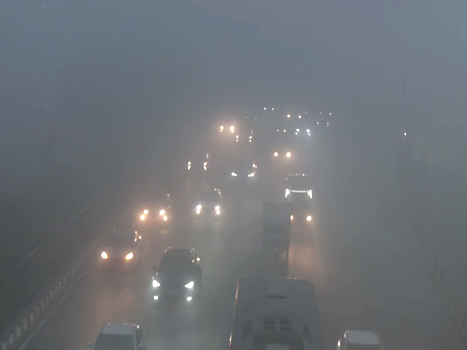 Vehicles Commute Amid Dense Fog in Delhi (Photo/ANI)