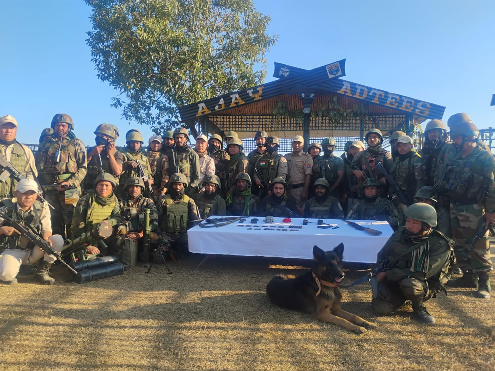 Security Forces with recovered arms and ammunition (Photo/ANI)