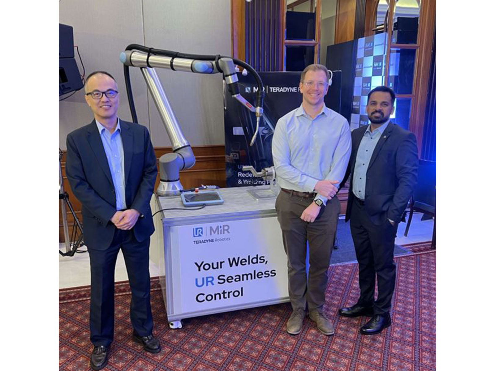 Poi Toong Tang, VP Sales APAC; James Davidson, Chief AI Officer; Sougandh K M, Business Director South Asia, at ElevateX 2026, Bengaluru