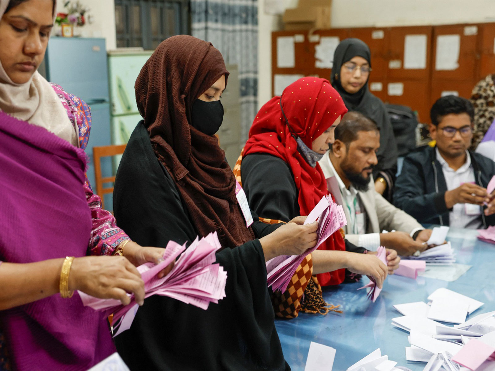 Electoral workers count the votes, during the 13th general election in Dhaka, Bangladesh (Photo/Reuters)
