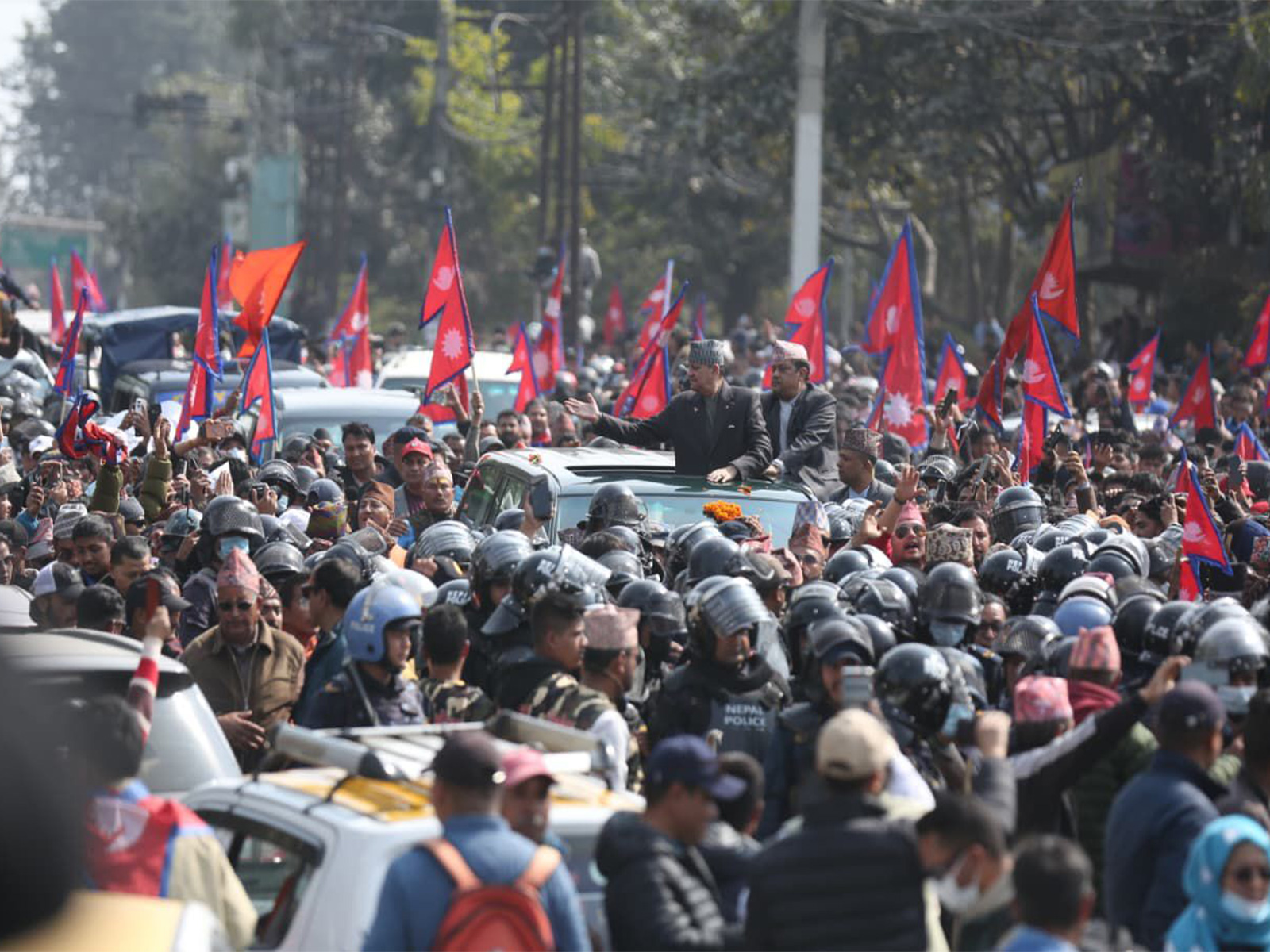 Pro-monarchist supporters gather on the streets of Kathmandu to welcome former King Gyanendra Shah ahead of Nepal's parliamentary elections. (Photo/ANI)