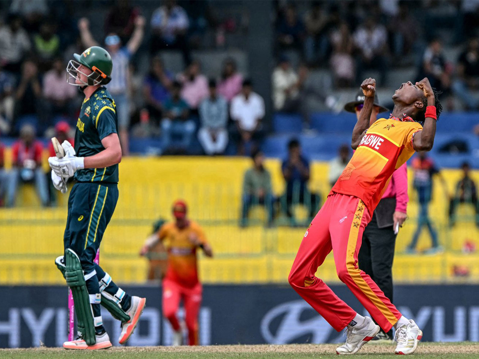 Australia and Zimbabwe teams in action. (Photo: @ICC X)