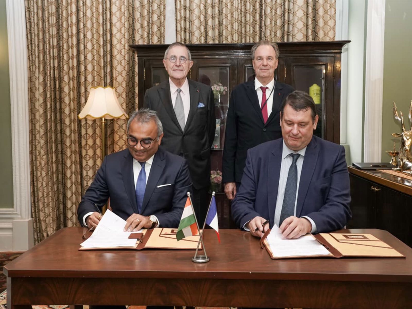 Ashwani Gupta, Whole-time Director and CEO, APSEZ, Herve Martel, CEO, Marseille Fos. ; Standing: Gerard Mestrallet, Special Envoy, French President for IMEC. Renaud Muselier, President of South Region (Photo- Adani Group)