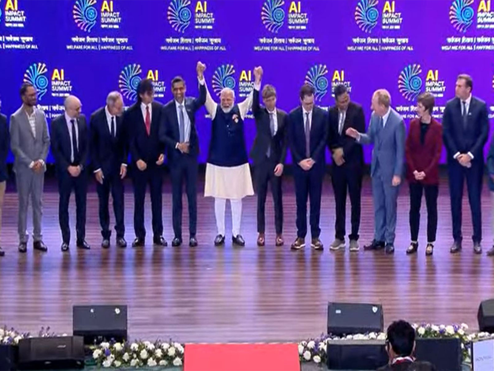 Prime Minister Narendra Modi joins world leaders, heads of state, and global tech CEOs for a family photo at Bharat Mandapam during the India AI Impact Summit 2026 in New Delhi. (Photo: DD News)
