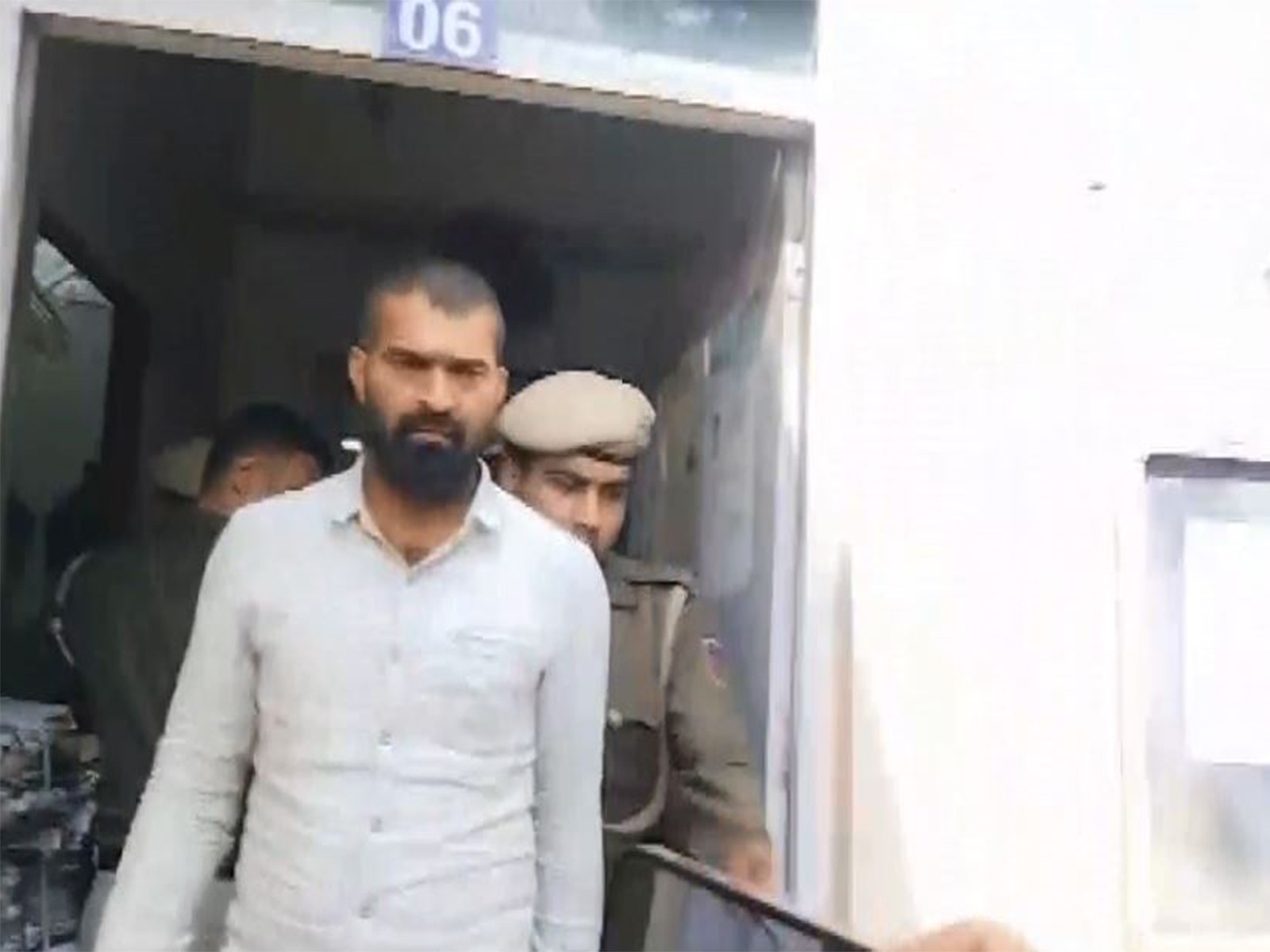 Indian Youth Congress workers brought out of the Patiala House Court (Photo/ANI)