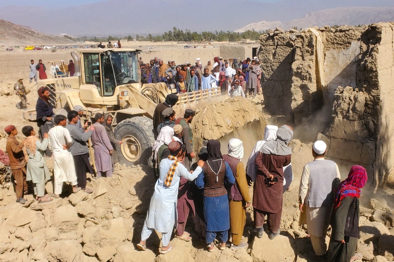 Residents gather at the site, following the Pakistani airstrikes, in Bihsud district, Nangarhar province, Afghanistan (Photo/Reuters)