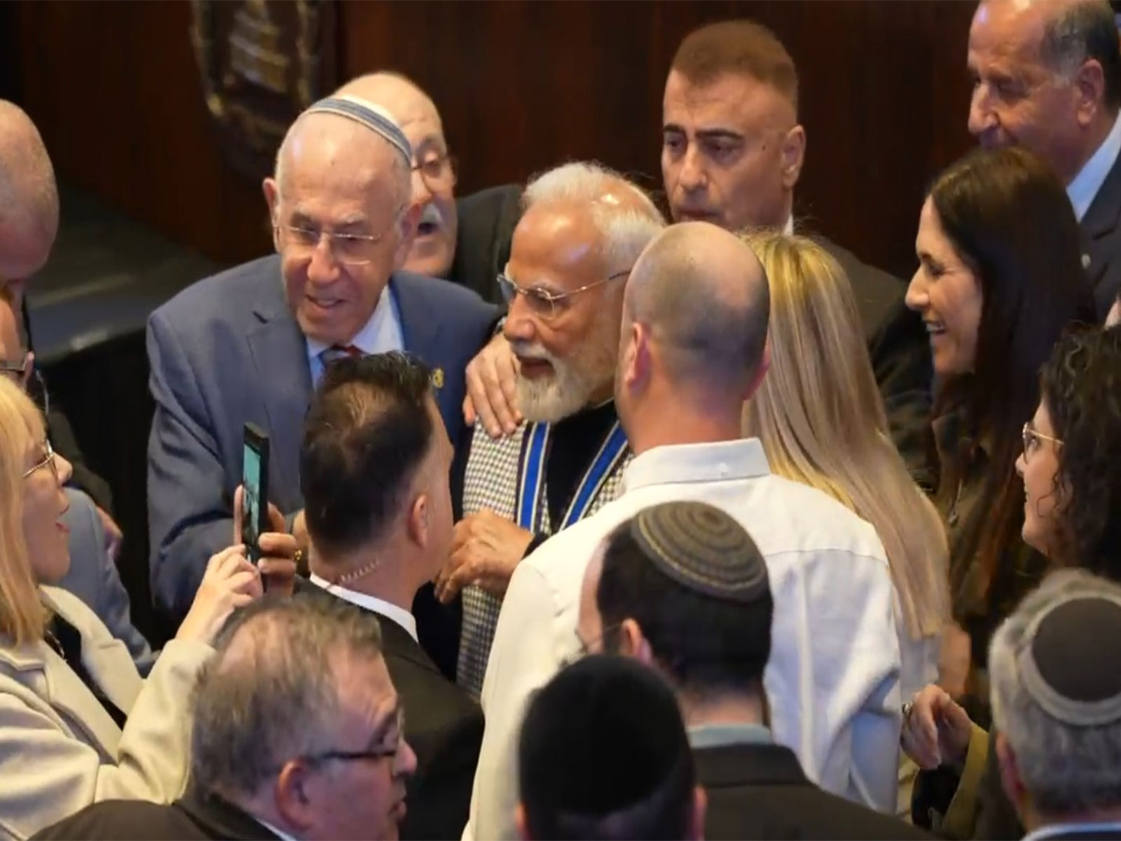 Israeli Members of the Parliament queuing up to PM Modi (Photo/ANI)