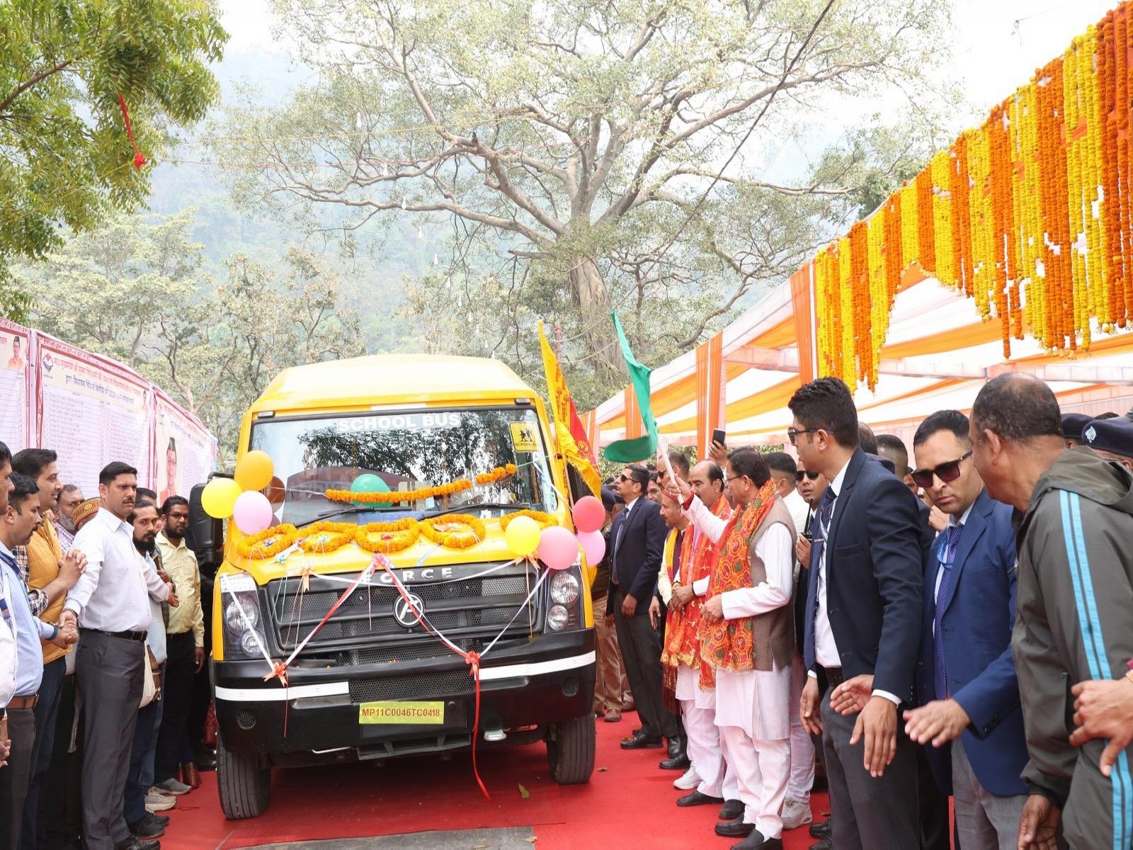 Uttarakhand CM Pushkar Singh Dhami flags off CSR vehicles in Tanakpur (Photo/ANI)