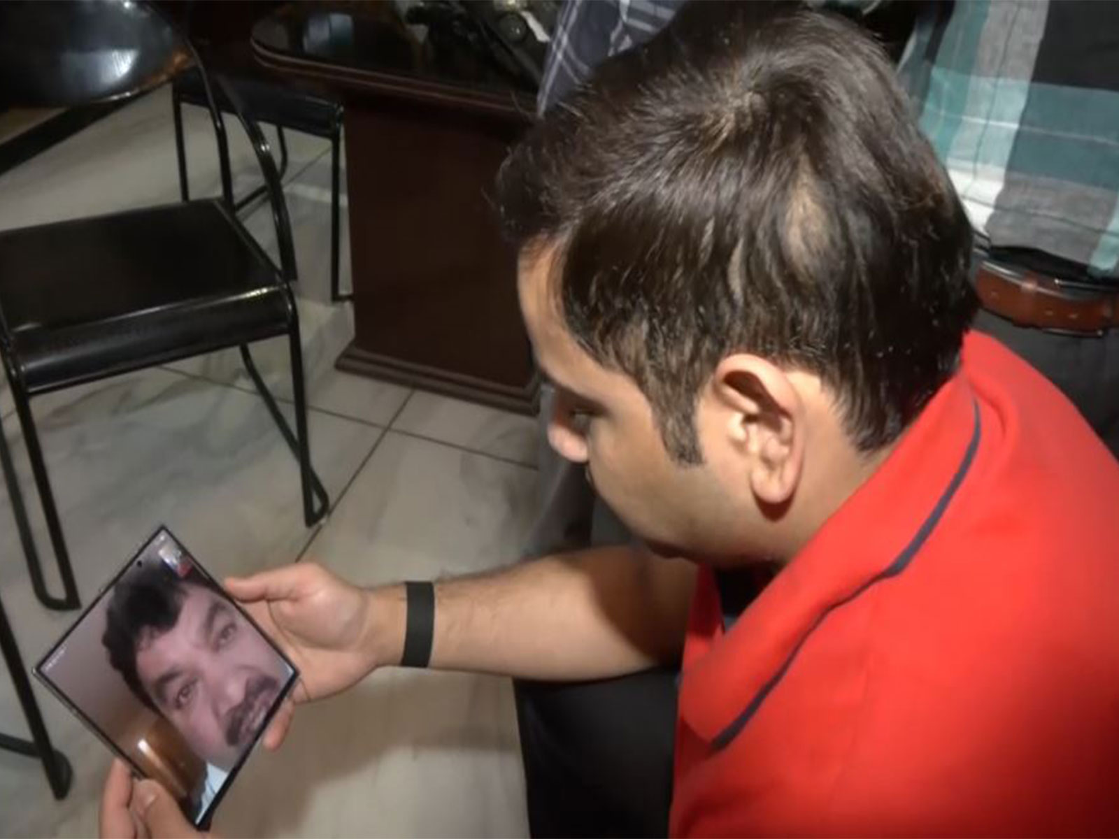 Sagar Shukla speaks to his father former MLA Sanjay Shukla on video call while he is stranded in Dubai amid the Middle East crisis (Photo/ANI)