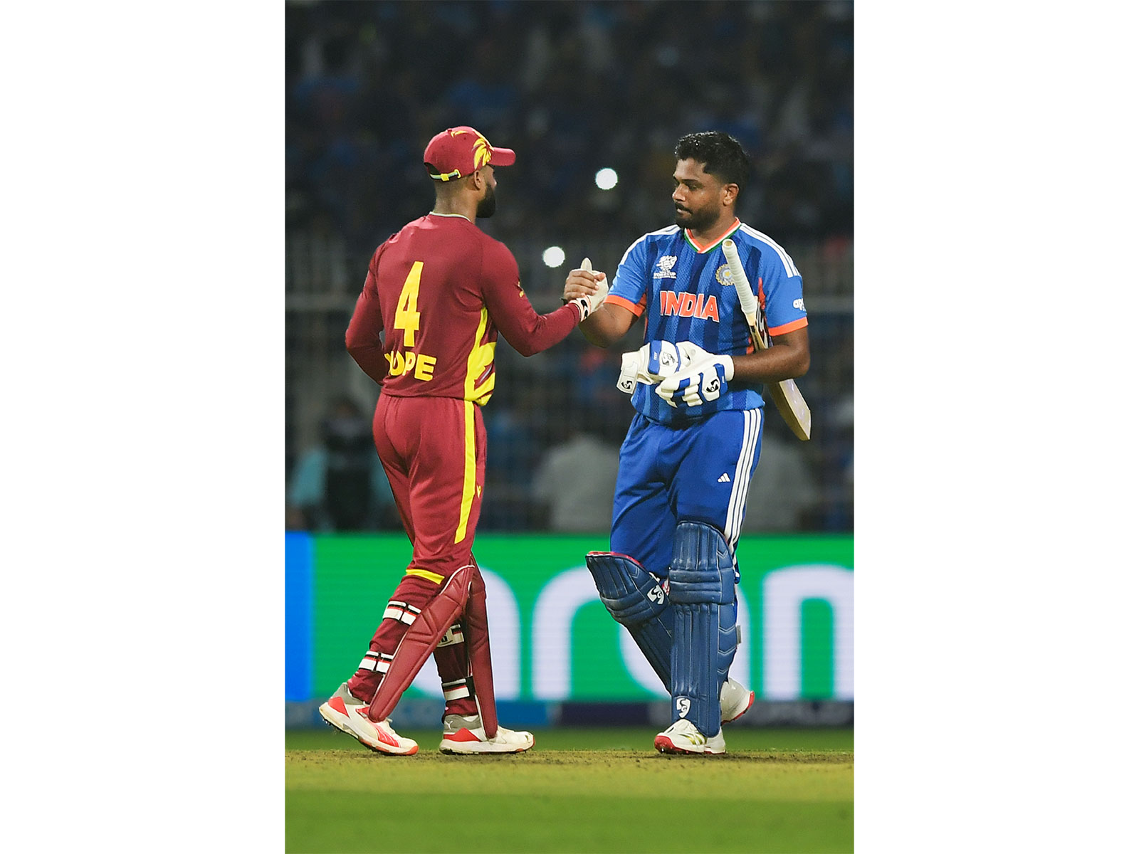 Shai Hope (Left) shaking hands with Sanju Samson (Right) (Photo: ANI)