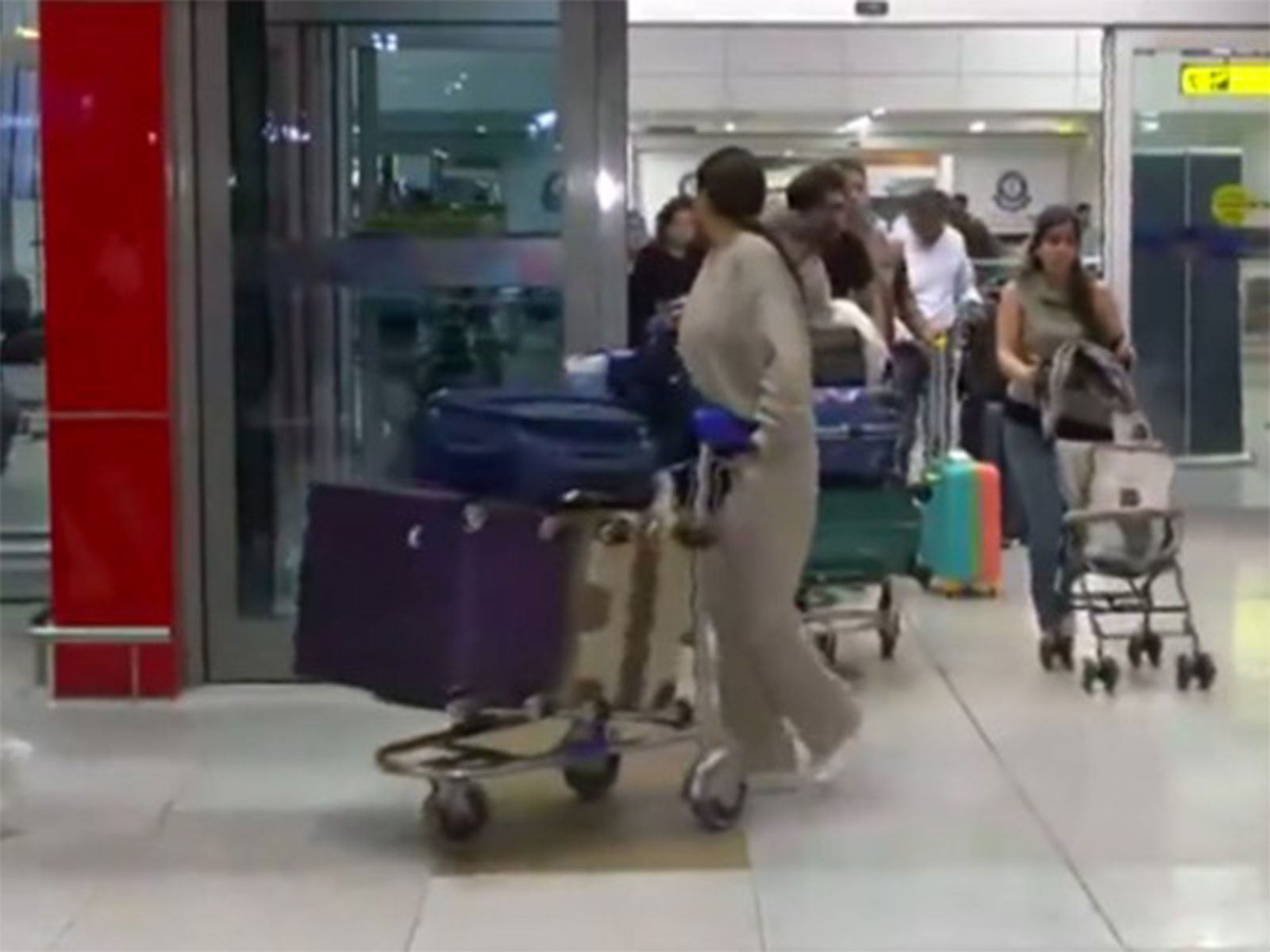 Passenger who arrived at IGI Airport (Photo/ANI)