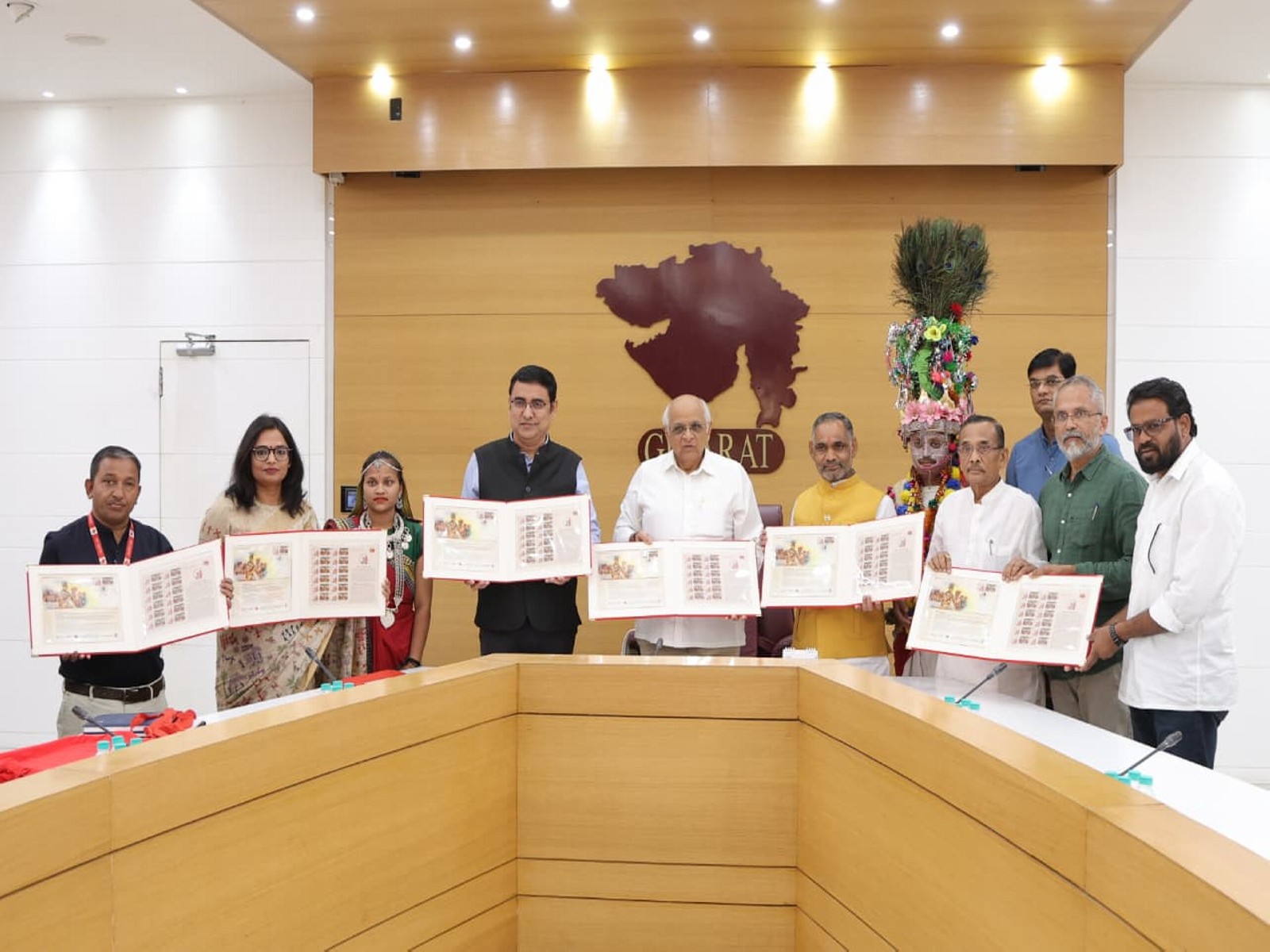 Gujarat CM Bhupendra Patel unveils first copy of postal stamp and special cover (Photo X/Bhupendra Patel)