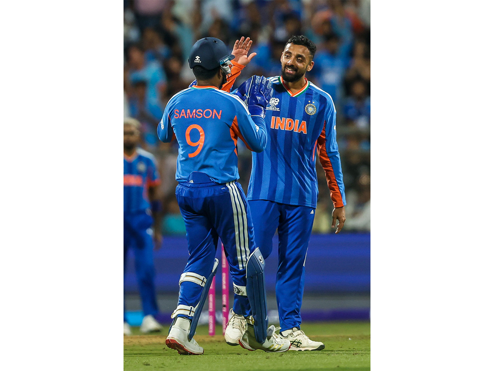 Varun Chakaravarthy and Sanju Samson. (Photo/ANI)